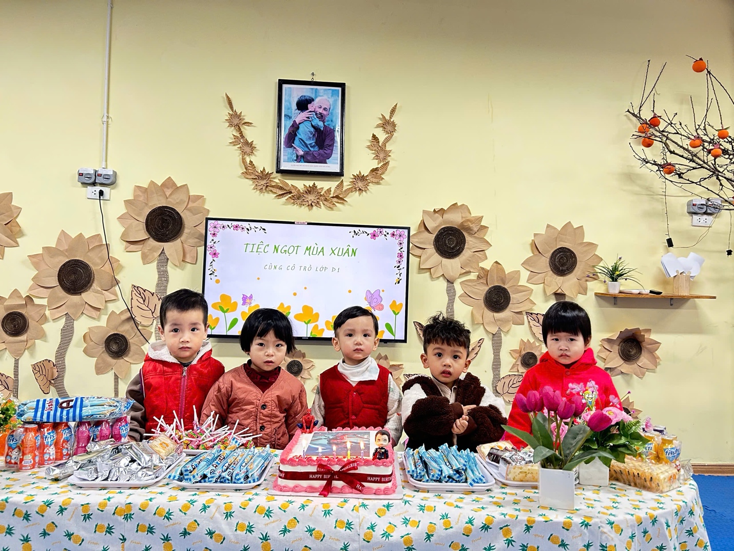 A group of children sitting at a table

AI-generated content may be incorrect.