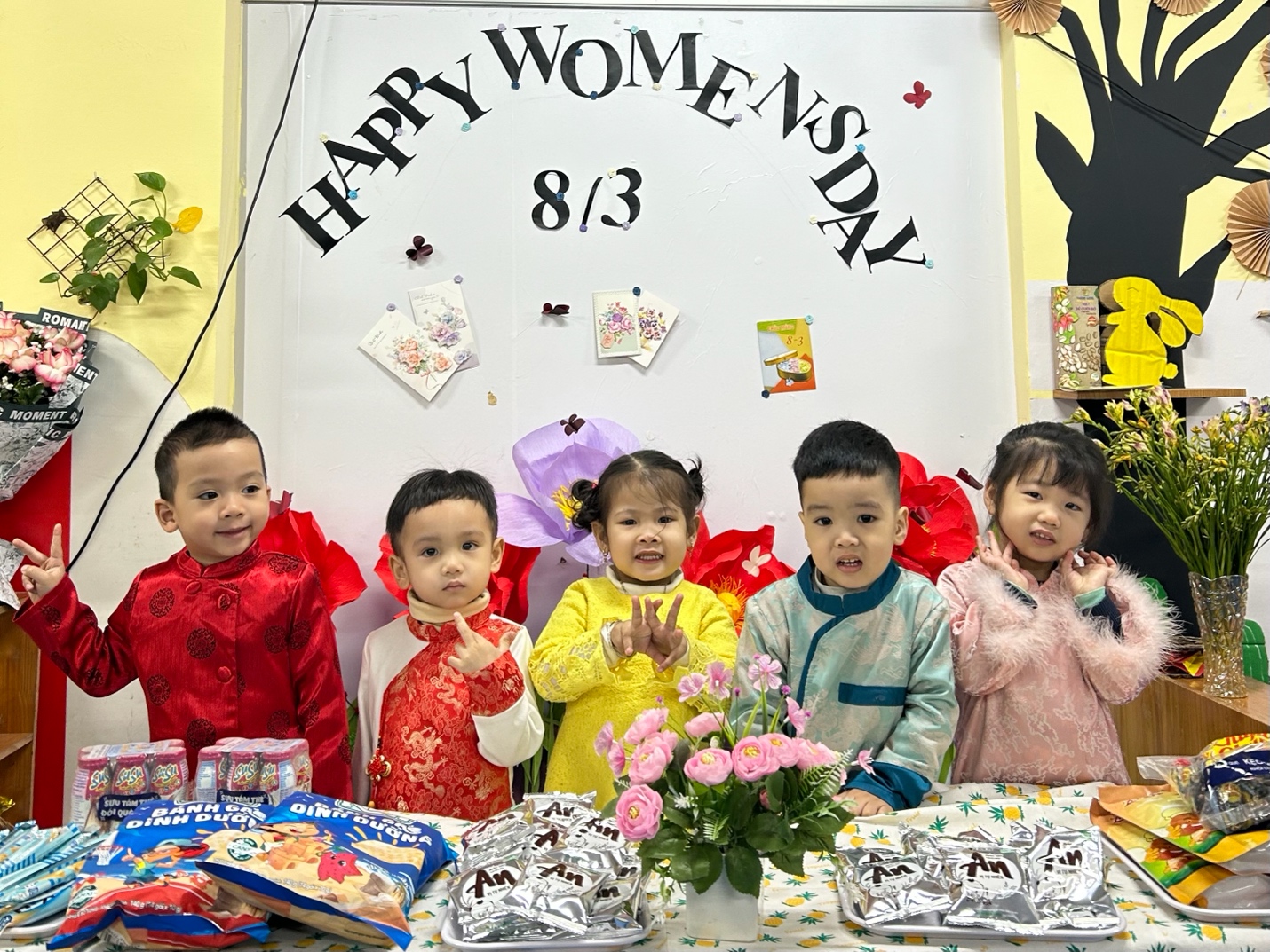A group of children sitting at a table

AI-generated content may be incorrect.