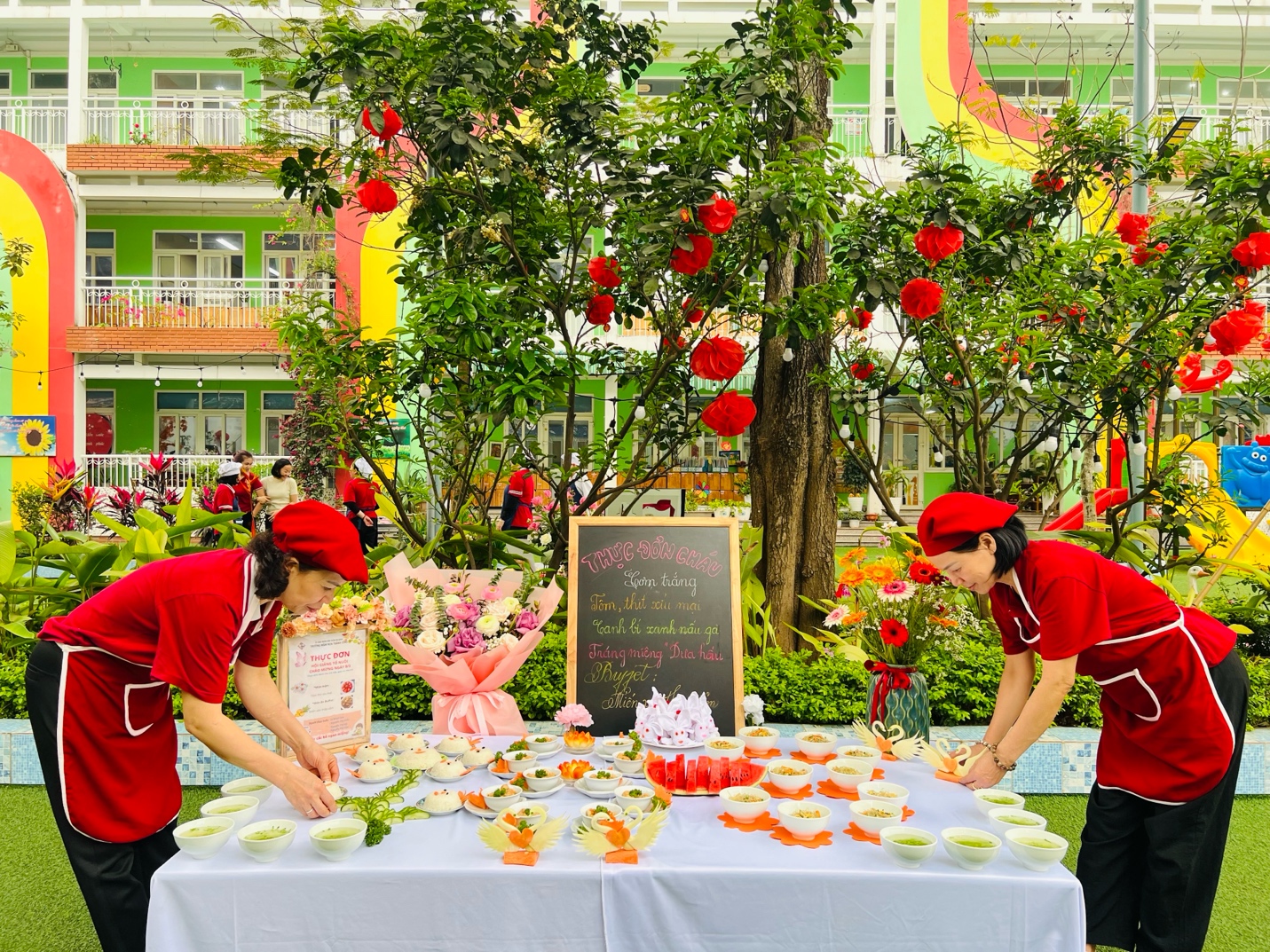 A group of women in red uniforms preparing food

AI-generated content may be incorrect.