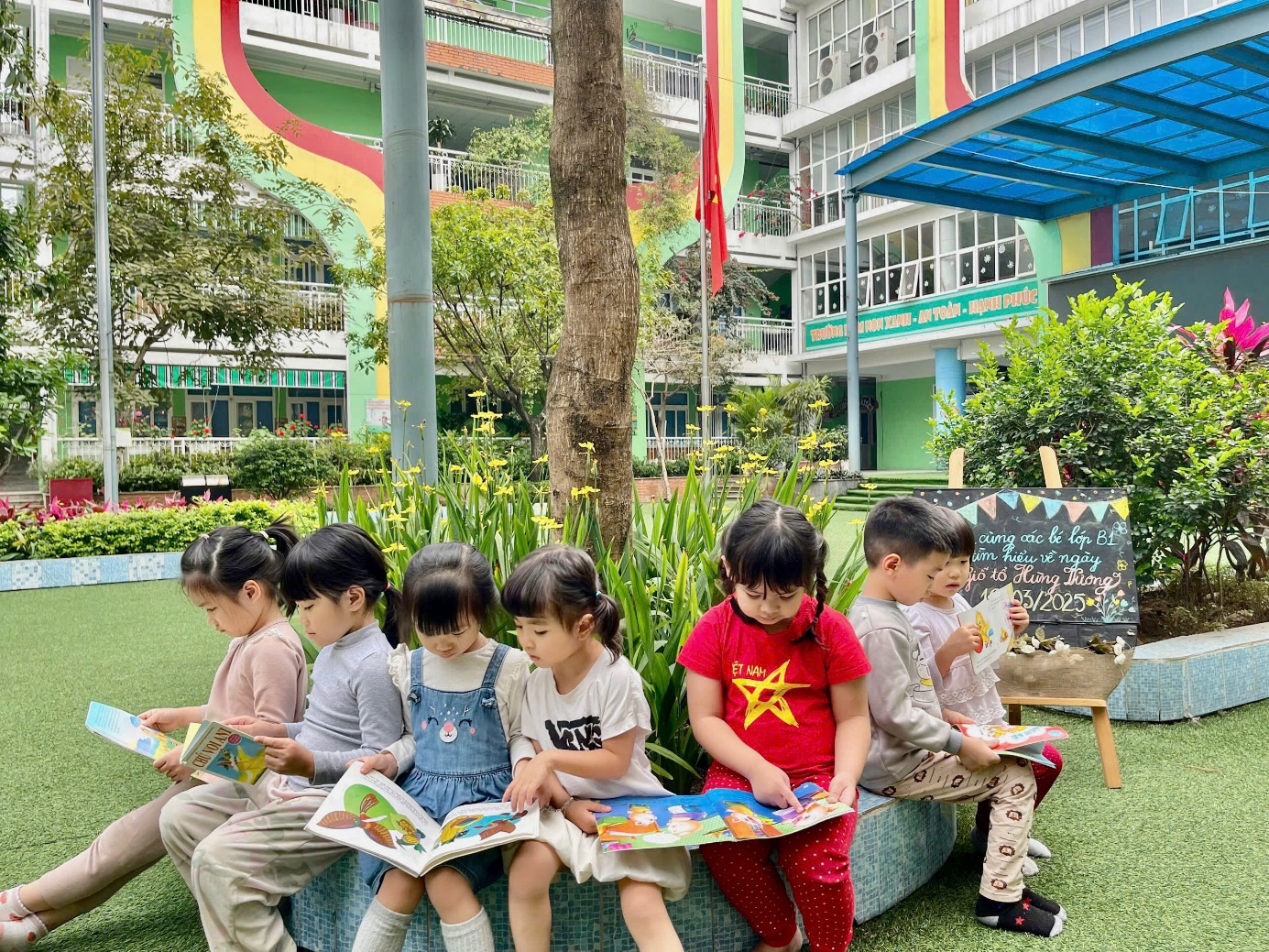 A group of children reading books outside

AI-generated content may be incorrect.